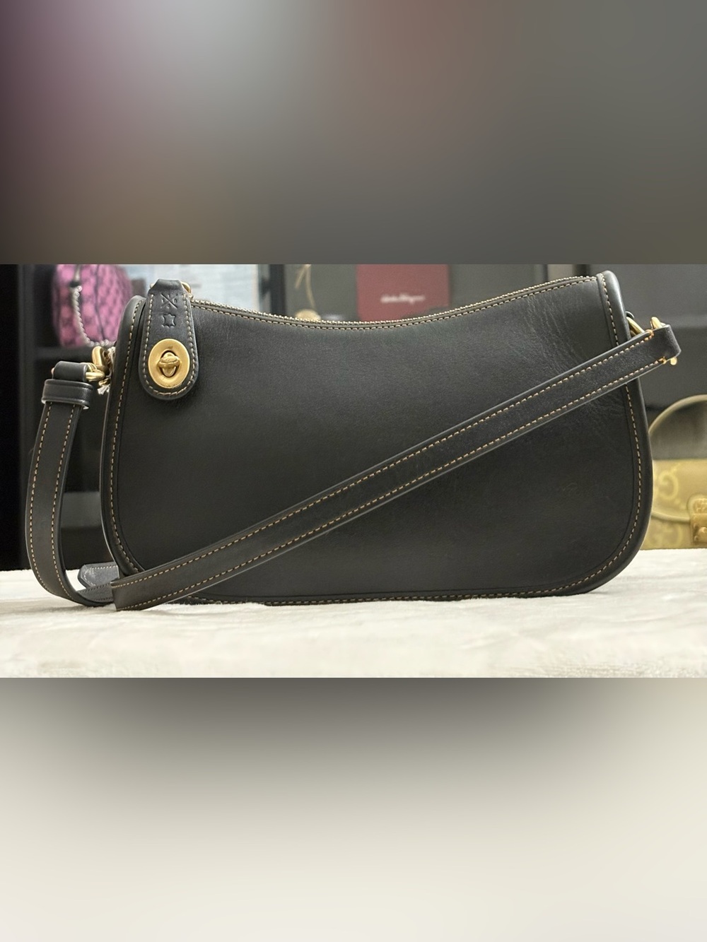 Coach Black Swinger Glove-Tanned Leather Crossbody Bag.